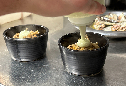 Preparación de plato Trasmallo
